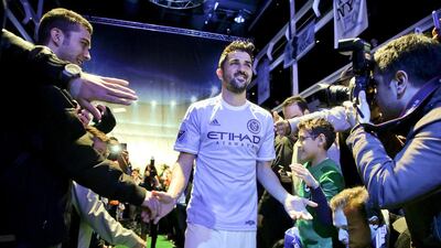 Spanish soccer star David Villa is greeted by fans during the unveiling of New York City Football Club’s inaugural season kits in November. Julie Jacobson / AP Photo