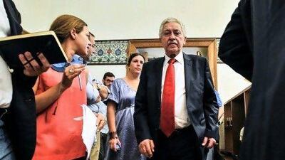 Greek Democratic Left party leader, Fotis Kouvelis, centre, arrives at a press conference after his meeting with the Greek Socialist Party (Pasok) in Athens .
