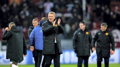 David Moyes applauds the fans after United thrashed Bayer Leverkusen 5-0 in Germany during the Champions League group stage in November 2013. Getty