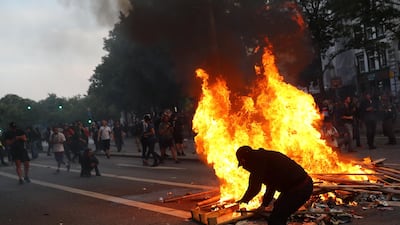 Protesters burn garbage during a demonstration at the G20 summit in Hamburg