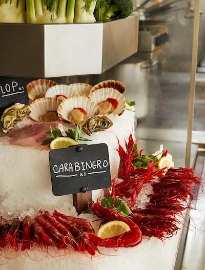 The UK chain serves Spanish tapas and seafood prepared on the spot. Photo: Barrafina