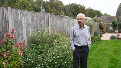 Abdulrazak Gurnah poses for pictures at his home in Canterbury, England, after winning the Nobel Prize in Literature. EPA