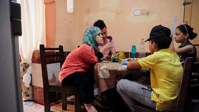 She has a meal at home with her nephews. Reuters