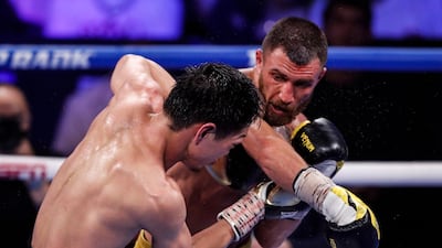 Vasiliy Lomachenko lands a right cross on Masayoshi Nakatani during their bout in Las Vegas. EPA