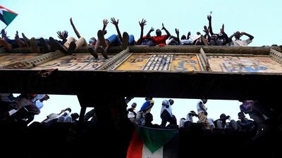 Sudanese protesters attend a demonstration in front of the defence ministry. Reuters
