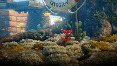 Yarny, the hero of Unravel, can use his thread as a lasso to climb. EA / Coldwood via AP