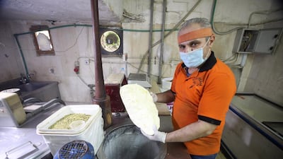 Syrian Migrant Yasser, aka Abo Aly, who feld from the armed conflict in Syria, works at an ice cream workshop in Cairo, Egypt. Yasser came to Egypt in 2012 to escape the armed conflict in Syria, and he used to work in this field for 25 years at the Hamidiyeh market in Damascus. World Refugee Day is marked on 20 June each year to highlight the suffering of the tens of millions of people forced to flee their homes due to war or persecution. EPA