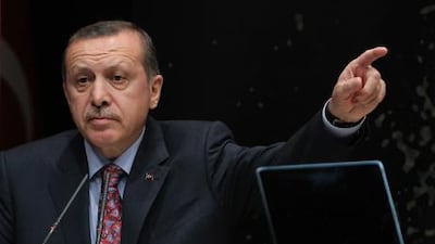 Turkish Prime Minister Recep Tayyip Erdogan defends the legislation passed that restricts the sale of alcohol. AP Photo