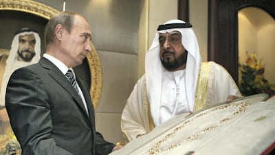 Sheikh Khalifa bin Zayed presents the country's highest award, the Zayed Order, to Russian President Vladimir Putin at the Mushrif Palace in Abu Dhabi in 2007. AFP Photo
