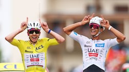 UAE Team Emirates XRG's Tadej Pogacar, wearing the yellow jersey, and teammate Isaac Del Toro, wearing the white jersey, at the end of Stage 20 of the Tour de France. Reuters