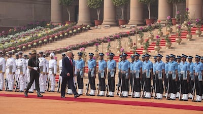 US President Donald Trump reviews a guard of honour during a ceremonial reception at Rashtrapati Bhavan, the Indian Presidential Palace, in New Delhi, India. AP