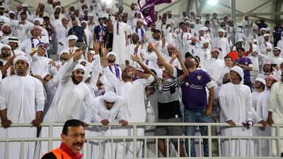 Al Ain supporters celebrate at the final whistle. Karim Jaafar / AFP