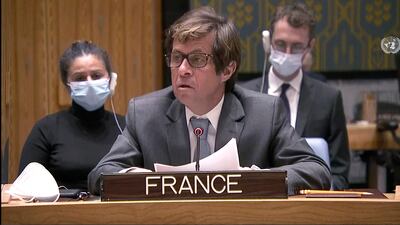 France's ambassador Nicolas de Riviere follows proceedings. AP