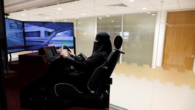 Trainee Amira Abdulgader practices on a simulator. Ahmed Jadallah / Reuters