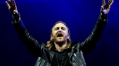 FILE - This Sept. 13, 2013 file photo shows French recording artist David Guetta performing at the opening night of the 5th annual Rock in Rio music festival, in Rio de Janeiro, Brazil. Guetta will project a full-length music video for his new track “One Voice� onto the exterior of the United Nations Secretariat Building, Friday, Nov. 22, to launch “The World Needs More" campaign. (AP Photo/Felipe Dana, File)