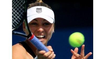 Vera Zvonareva looks happy with a forehand against Roberta Vinci yesterday. Marwan Naamani / AFP
