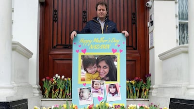 Richard Ratcliffe, the husband of the jailed UK-Iranian woman Nazanin Zaghari-Ratcliffe, delivers a mothers day card and flowers to the Iranian Embassy in London. EPA