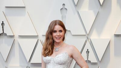 Amy Adams in white and silver Versace. Photo: EPA