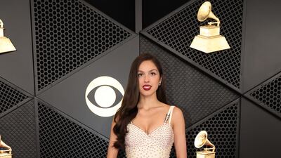 Olivia Rodrigo wears vintage Atelier Versace. Reuters