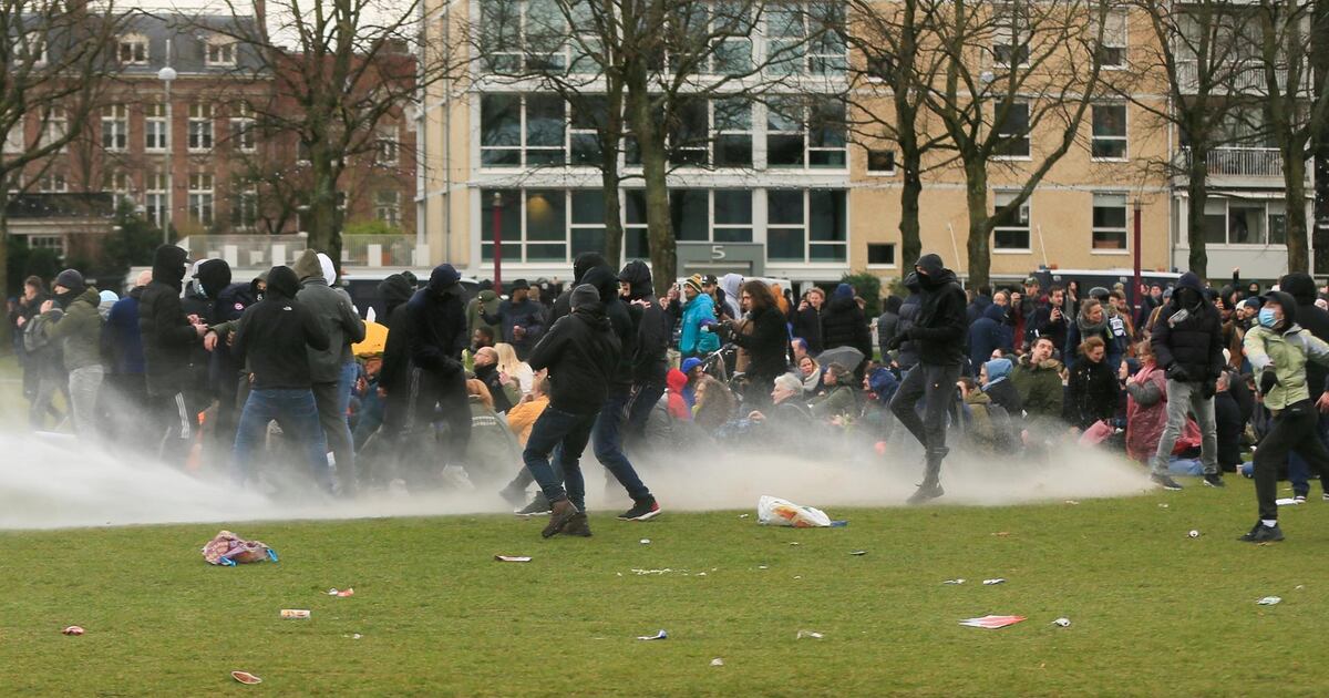 Dutch Curfew Nations tighten virus curbs as Dutch curfew protesters clash with ...