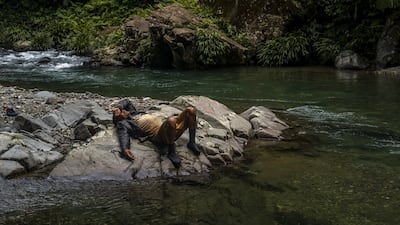 A photo by photographer Federico Rios Escobar showing a migrant resting while trekking from Colombia to Panama has been shortlisted for a prize at the V&A Museum in London. Photo: Federico Rios Escobar