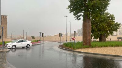 The weather forecaster urged motorists to take precautions and warned of reduced visibility as the rainfall became heavier. Antonie Robertson / The National