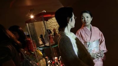 UAE-Japan Cultural Centre representatives Kaoru Makhlouf, left, and Naoko Kishida attend the "Dolls Are Us" doll show, where they displayed Japanese dolls, at the Corporate Executive Hotel Apartments' Caffeine lounge in Dubai this week.
