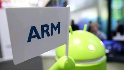 An Arm Holdings Plc logo is held by an Android operating systems robot at the Mobile World Congress in Barcelona, Spain, on Thursday, March 1, 2012. The Mobile World Congress, operated by the GSMA, expects 60,000 visitors and 1400 companies to attend the four-day technology industry event which runs Feb. 27 through March 1. Photographer: Chris Ratcliffe/Bloomberg