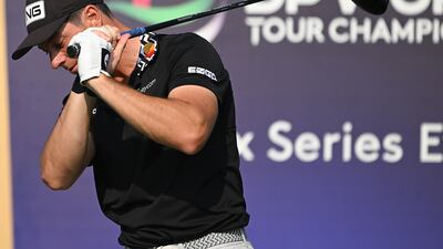 Viktor Hovland of Norway reacts after teeing off on the 14th hole. Getty Images
