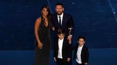 Lionel Messi poses with his family during the Best FIFA Football Awards. EPA