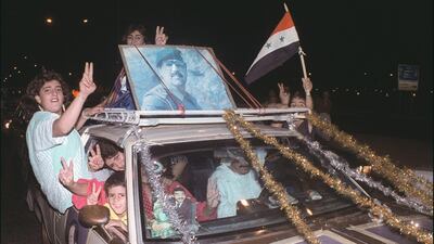 Iraqis in Baghdad celebrate the ceasefire between Iraq and Iran on August 20, 1988. AFP