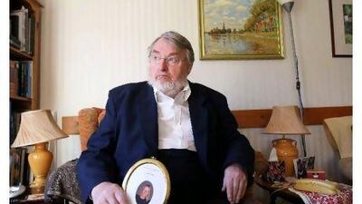 HAYWARDS HEATH. UK. 11th January 2012. ASSISTED DYING. John Bray (79) at his home in Haywards Heath, England, with a photograph of his son Simon. Stephen Lock for The National. Words: Dave Sapsted . FOR FOREIGN.