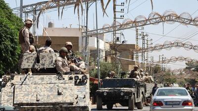 Lebanese special forces patrol Qaa on June 28, 2016, a day after nine bombings struck the small Christian village. AP Photo