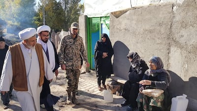 Iranian clerics visit victims of an earthquake in Varnakesh. EPA