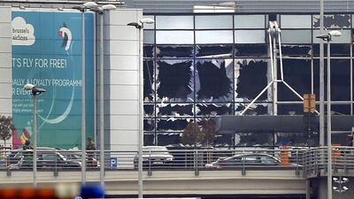 Broken windows seen at the scene of explosions at Zaventem airport near Brussels, Belgium. Francois Lenoir / Reuters