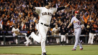 It was not one of their All-Stars but journeyman Travis Ishikawa, top, who delivered the big hit for the San Francisco Giants. David J Phillip / AP Photo