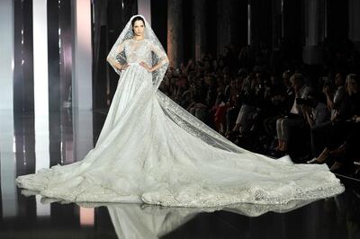 2014: A model wearing the final dress walks the runway during the Ralph & Russo show as part of Paris Fashion Week - Haute Couture Fall/Winter 2014-2015 at Pavillon Cambon Capucines on July 10, 2014 in Paris, France. Kristy Sparow / Getty Images