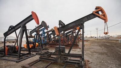 Data from the oil services company Baker Hughes showed that US oil rigs in use fell by 37 to 1,109, the lowest number since mid-2011. Scott Olson / Getty Images / AFP