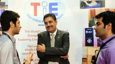Prashant Gulati, right, the mentoring director and past president of the Middle East chapter of TiE, at Gitex. Ravindranath K / The National