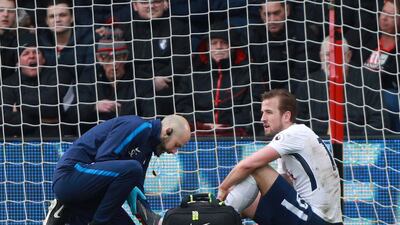 Harry Kane is set to have a scan on his ankle which will determine the severity of the injury he sustained at Bournemouth on Sunday. Ian Walton / Reuters
