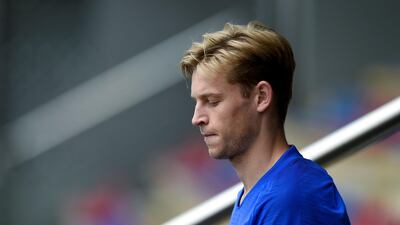 Barcelona's Dutch midfielder Frenkie de Jong heads out for training from the changing rooms. AFP