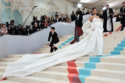 Rihanna shows off her baby bump in custom-made Valentino, at the "Karl Lagerfeld: A Line of Beauty" opening in New York. AFP