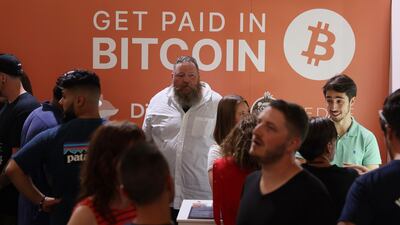 People at Bitcoin 2021 Convention in Miami, Florida. Bitcoin has continued its decline on Saturday despite positive news that El Salvador plans to make it legal tender in the country. Getty Images