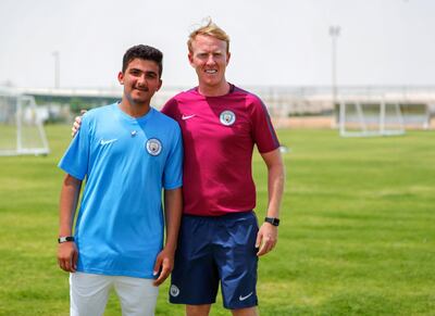 Saif Salem Ababneh (left) and coach Chris McCarthy. Victor Besa / The National.