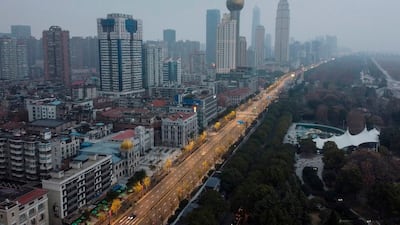 An aerial view shows residential and commercial buildings of Wuhan in China's central Hubei province. AFP