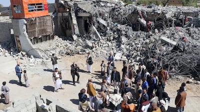 William David Grisley, UN resident co-ordinator for humanitarian affairs in Yemen, visits with a delegation a site reported to be a prison destroyed in a Saudi-led air strike in the Houthi stronghold of Saada, northern Yemen. AFP