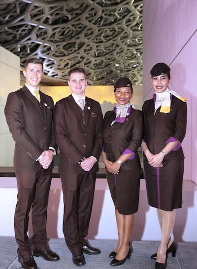Etihad Airways cabin crew in DVF-designed scarves and ties
