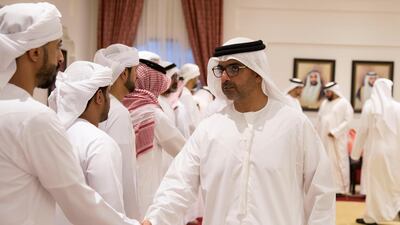 Sheikh Hamed bin Zayed, chairman of the Crown Prince Court of Abu Dhabi and Abu Dhabi Executive Council Member (right), meets the family of Captain Saeed Ahmed Rashid Al Mansouri. Mohammed Al Bloushi for the Ministry of Presidential Affairs )