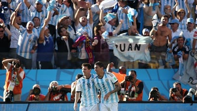Lionel Messi and Angel Di Maria celebrate Di Maria's winning goal, on an assist from Messi, late in extra time on Tuesday at the 2014 World Cup round of 16 in Sao Paulo, Brazil. Diego Azubel / EPA / July 1, 2014