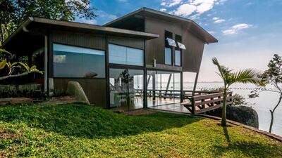 2. This boulder strewn stilted beach house in Brazil is the second-most wishlisted home on Airbnb.
